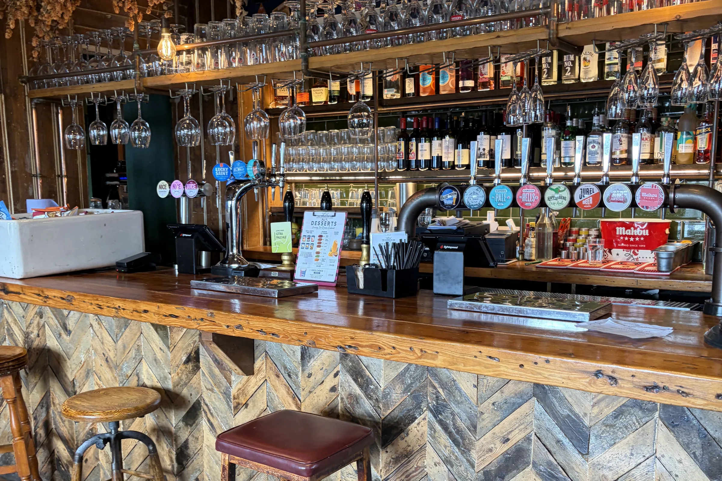 Dried hops hanging over the bar at Harbour Inn, Harbour Street, Folkestone